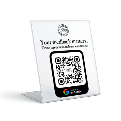 a sign with instructions for leaving feedback, including a QR code for a review system.