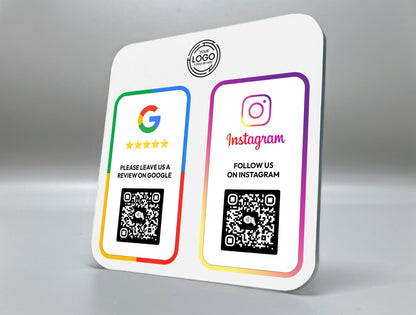 Modern reception desk setup featuring a custom acrylic multi-link review sign for collecting Google, Facebook, and Instagram reviews