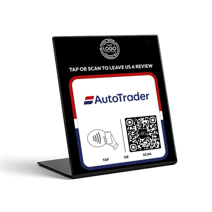 a sign with instructions for using a mobile payment service called AutoTrader. The sign provides two options for payment: tap or scan.