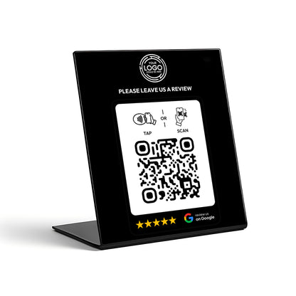 a black sign with a QR code and instructions for users to leave a review.