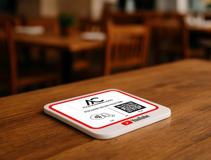 Close-Up of Black Acrylic YouTube Review Sign with NFC and QR Code for Smartphones
